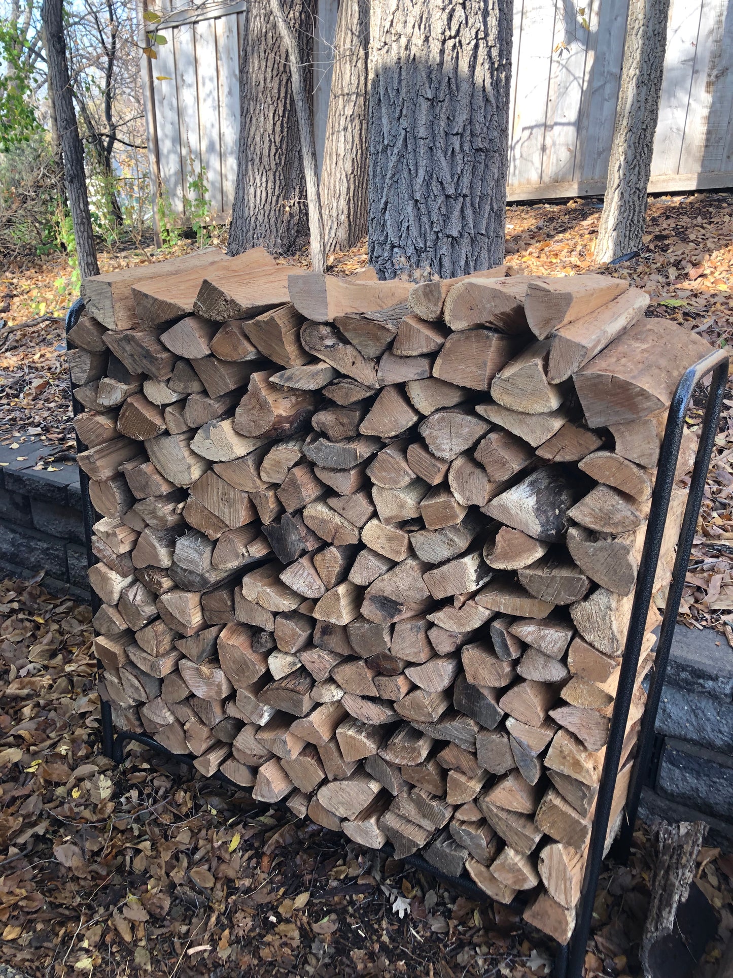 firewood rack full of frewood