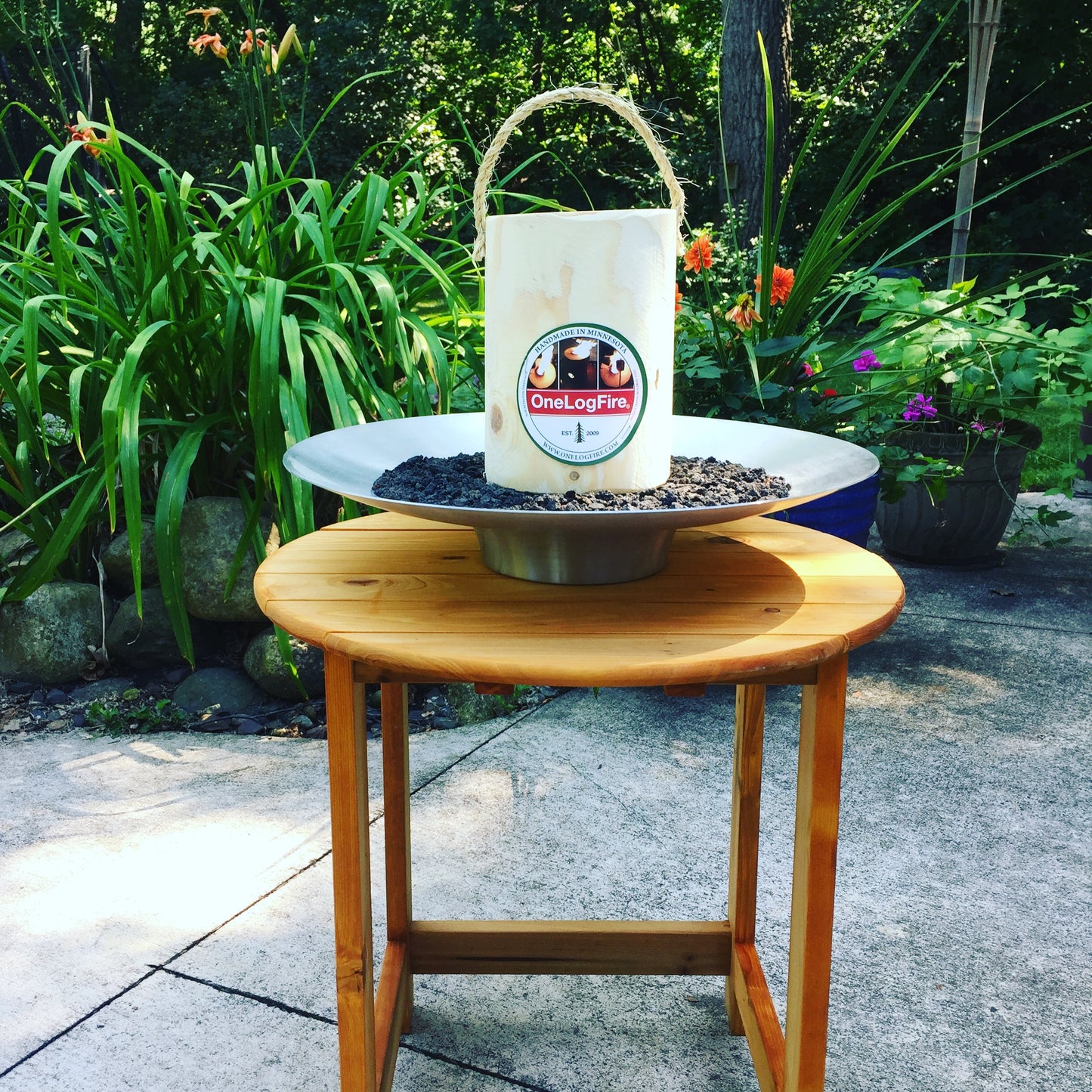 original OneLogFire in table top firepit with wood stand
