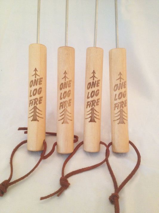 Four wooden marshmallow roasting sticks bundled together
